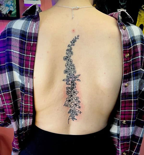 July Birth Flower Spine Tattoo