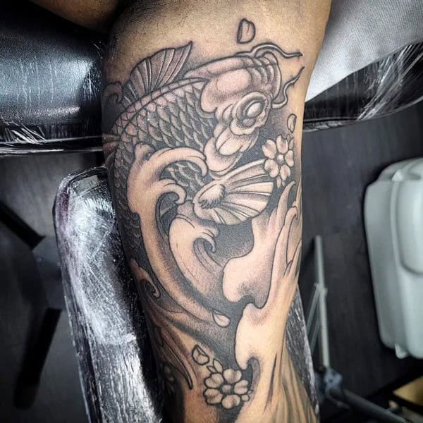 Koi Fish Bicep Tattoo