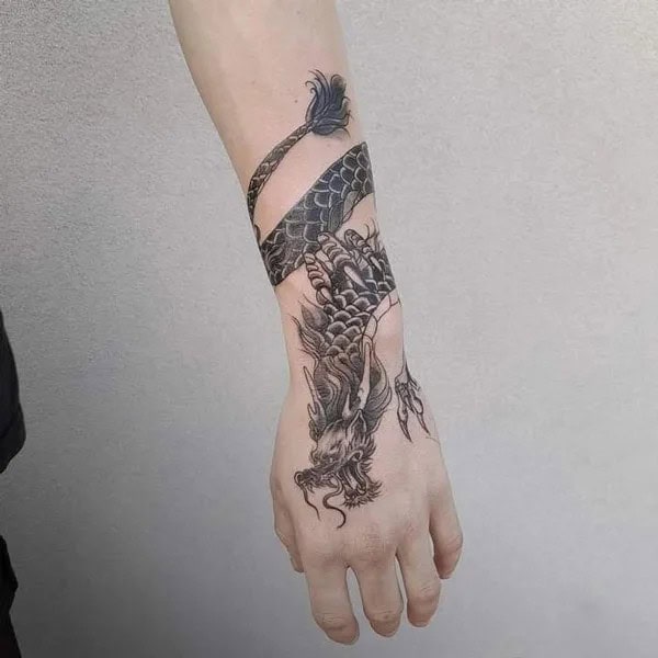 Chinese dragon tattoo on hand