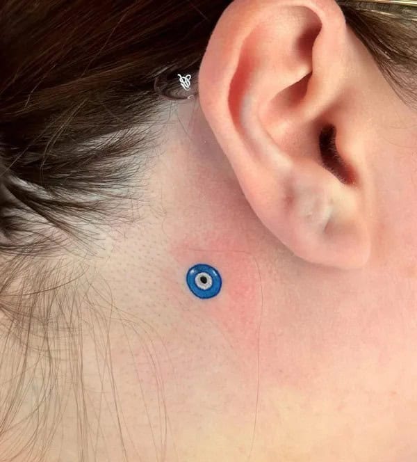 Evil Eye Tattoo Behind the Ear