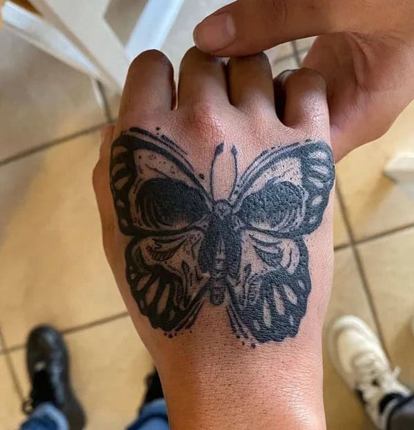 Butterfly Skull Hand Tattoo