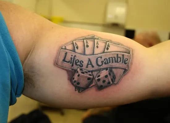 Life’s a Gamble Bicep Tattoo