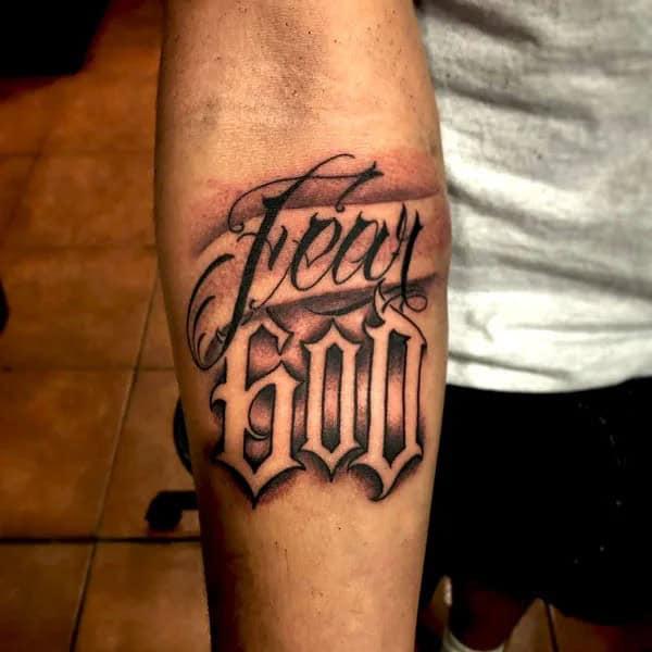 Fear God Tattoo on Forearm