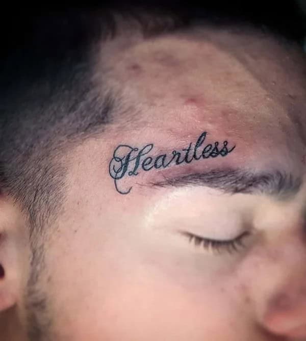 Heartless Tattoo On Forehead